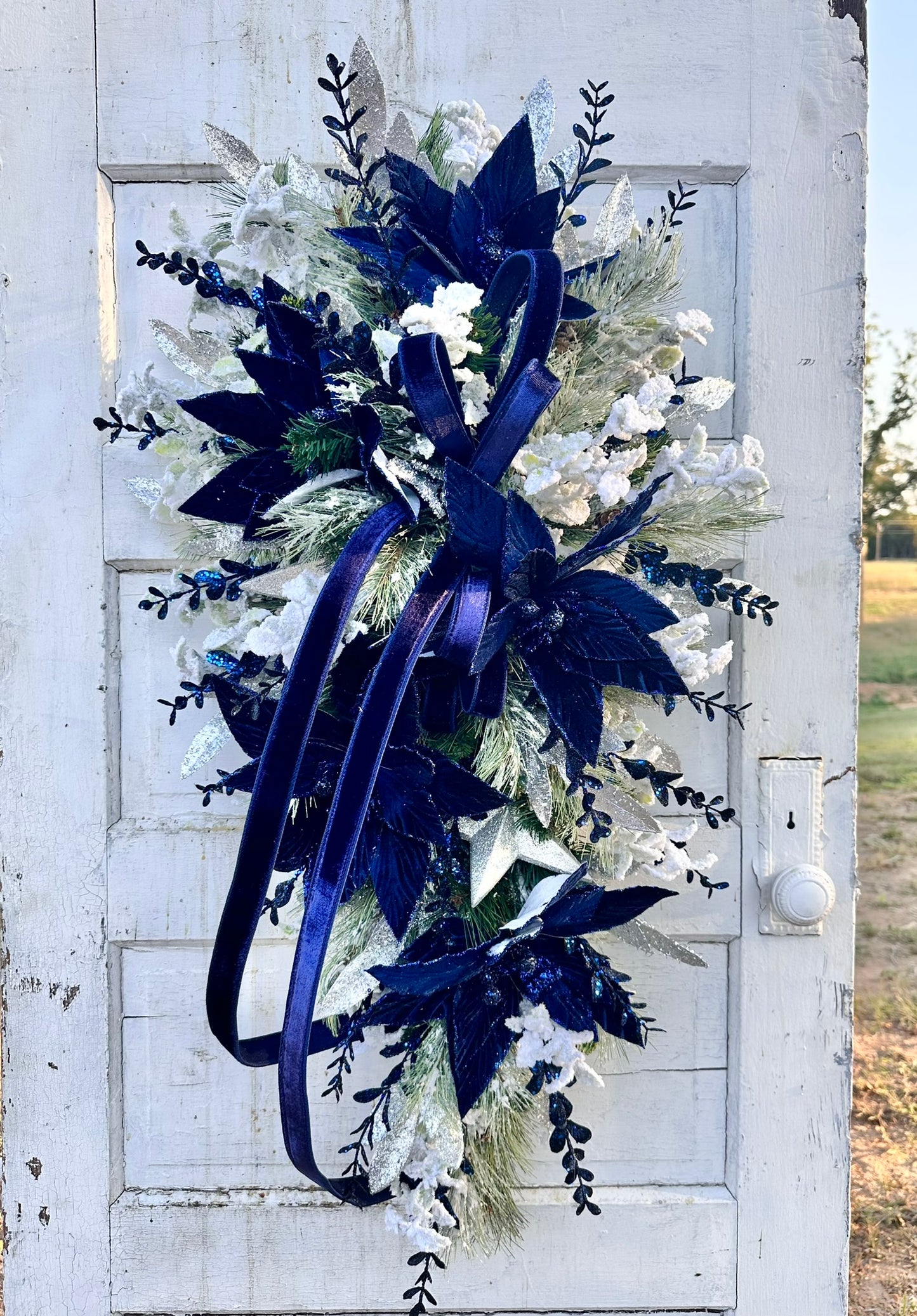 Elegant Blue & Silver Velvet Poinsettia Holiday Swag – 42"x23" Blue and Silver Christmas Door Decor | TCT Crafts