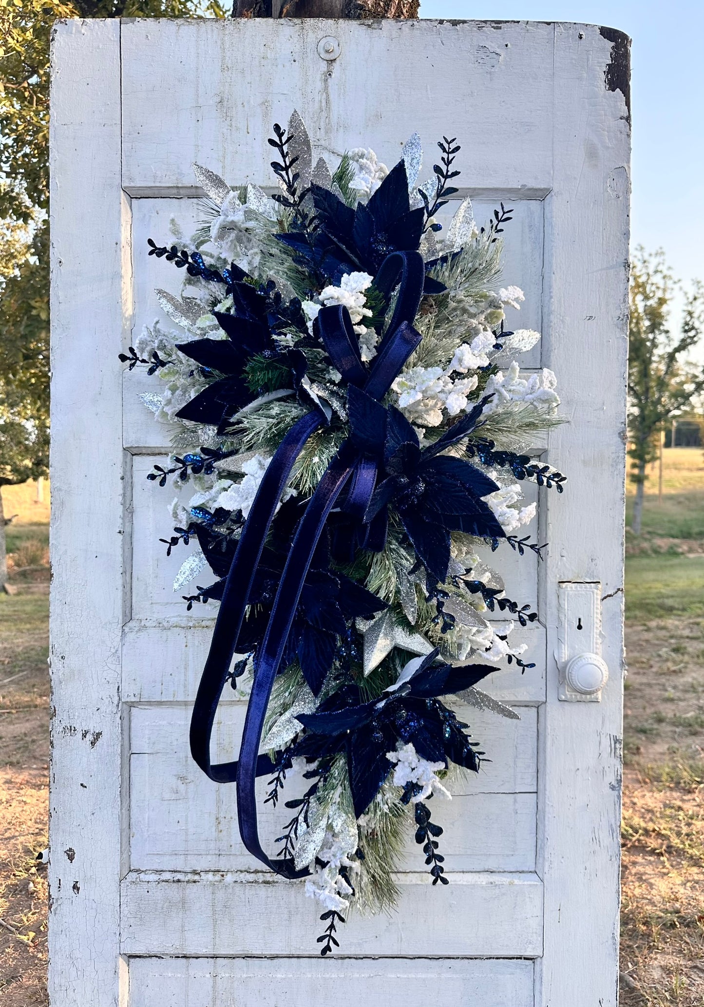 Elegant Blue & Silver Velvet Poinsettia Holiday Swag – 42"x23" Blue and Silver Christmas Door Decor | TCT Crafts