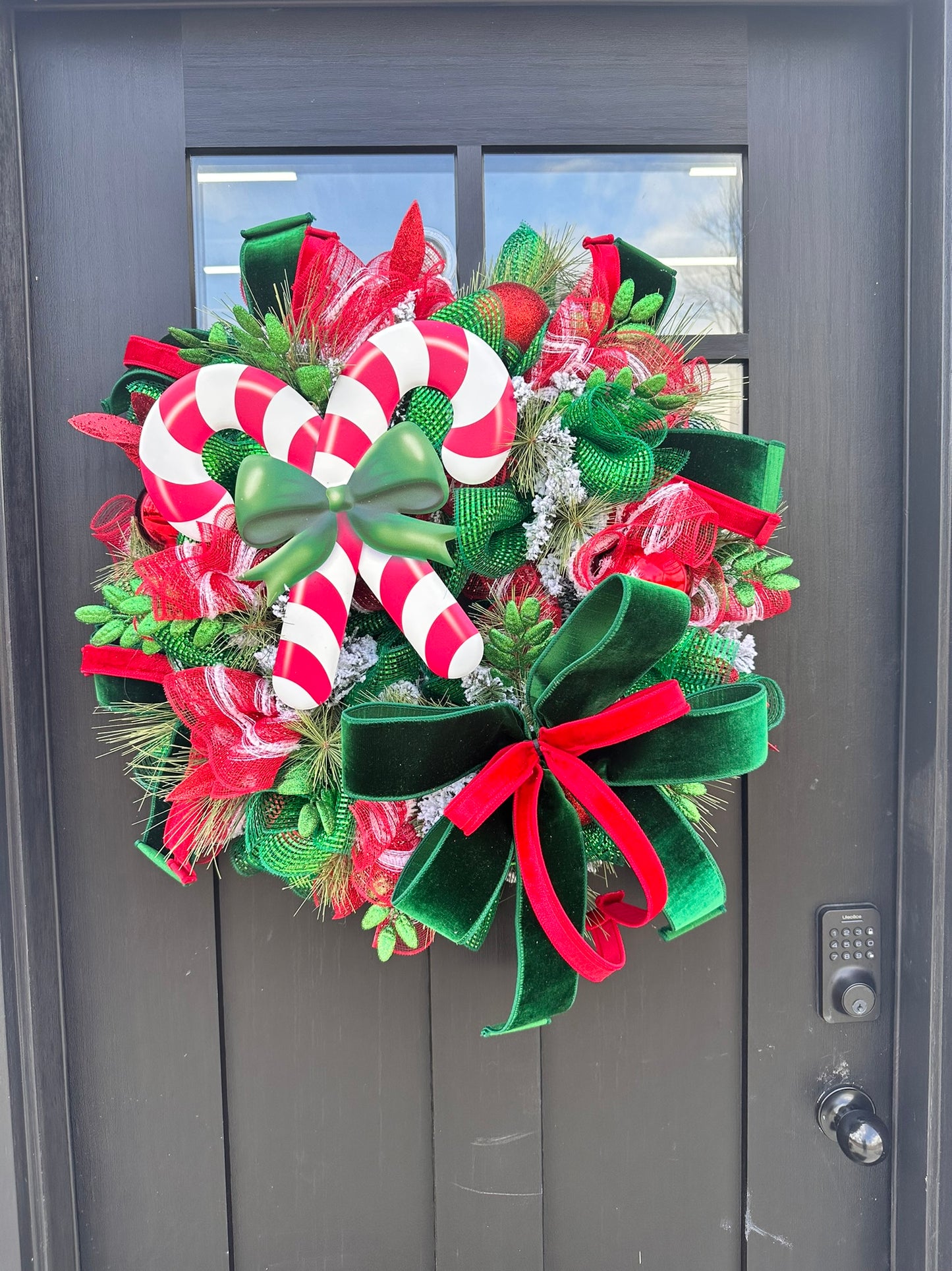 Red & Green Christmas Wreath with Candy Canes, Emerald Velvet Ribbon – 26" Festive Holiday Door Decor