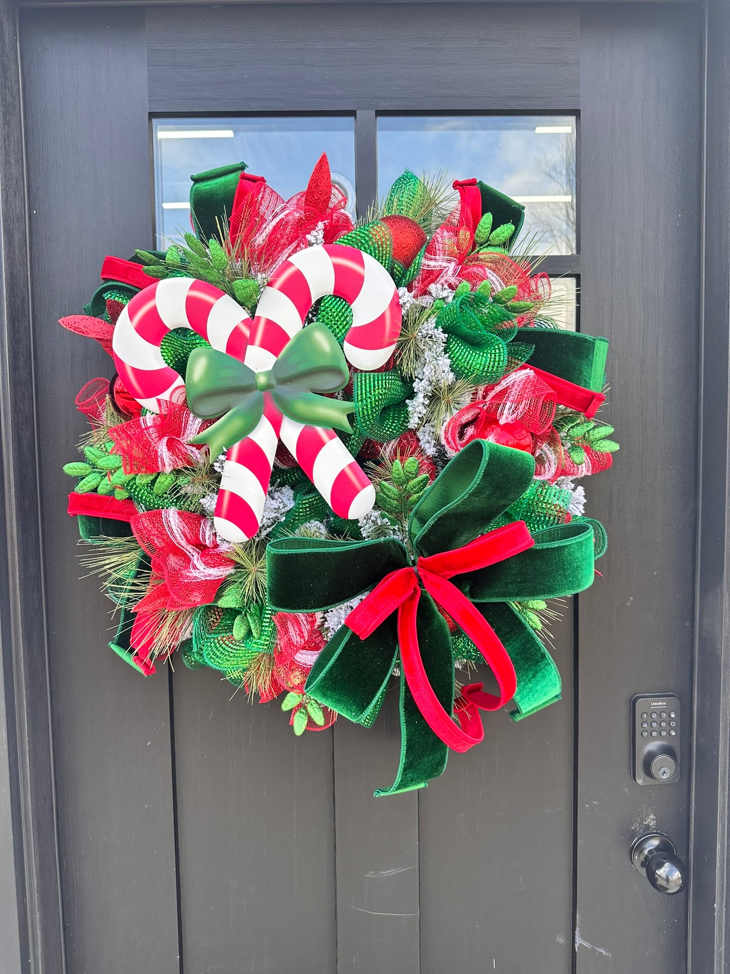 Red & Green Christmas Wreath with Candy Canes, Emerald Velvet Ribbon – 26" Festive Holiday Door Decor