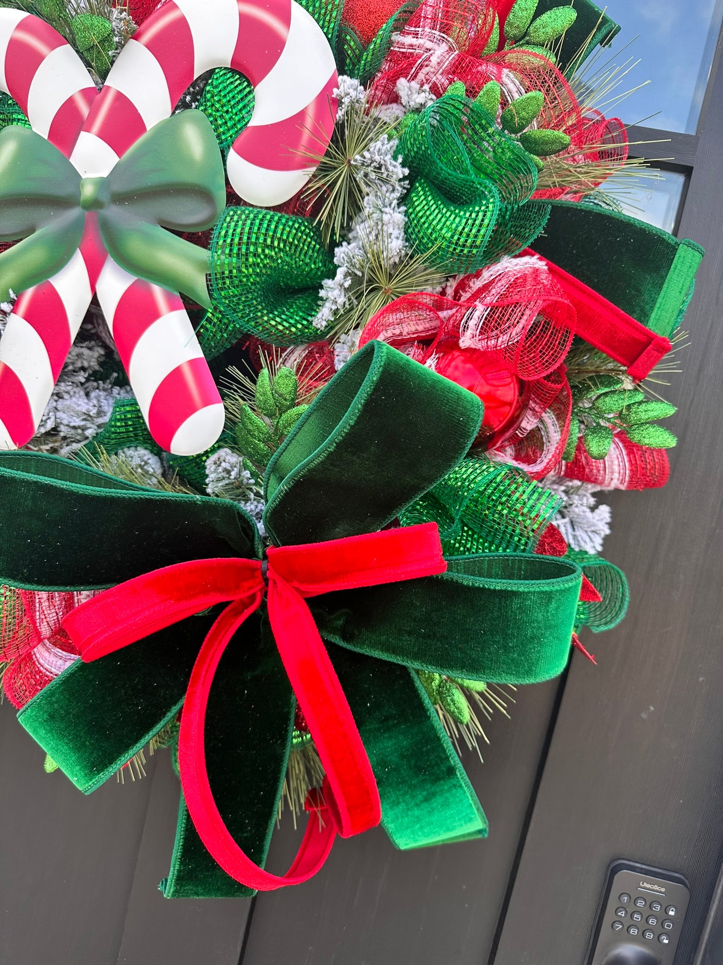 Red & Green Christmas Wreath with Candy Canes, Emerald Velvet Ribbon – 26" Festive Holiday Door Decor