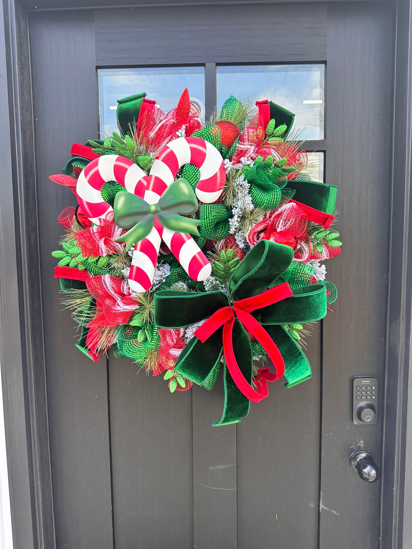 Red & Green Christmas Wreath with Candy Canes, Emerald Velvet Ribbon – 26" Festive Holiday Door Decor