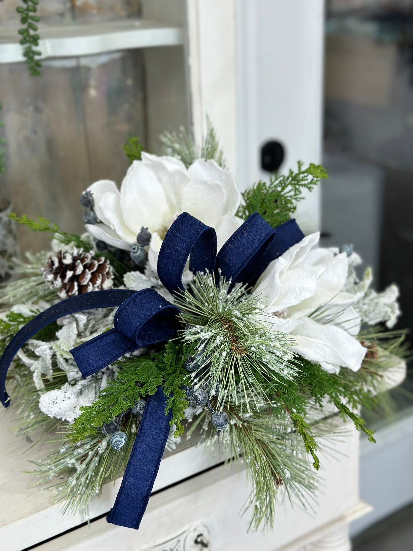 Snowy Magnolia and Blue Crabapple Winter Table Centerpiece - Frosted Pine and Pinecone Home Decoration - Foyer Entryway Floral Arrangement