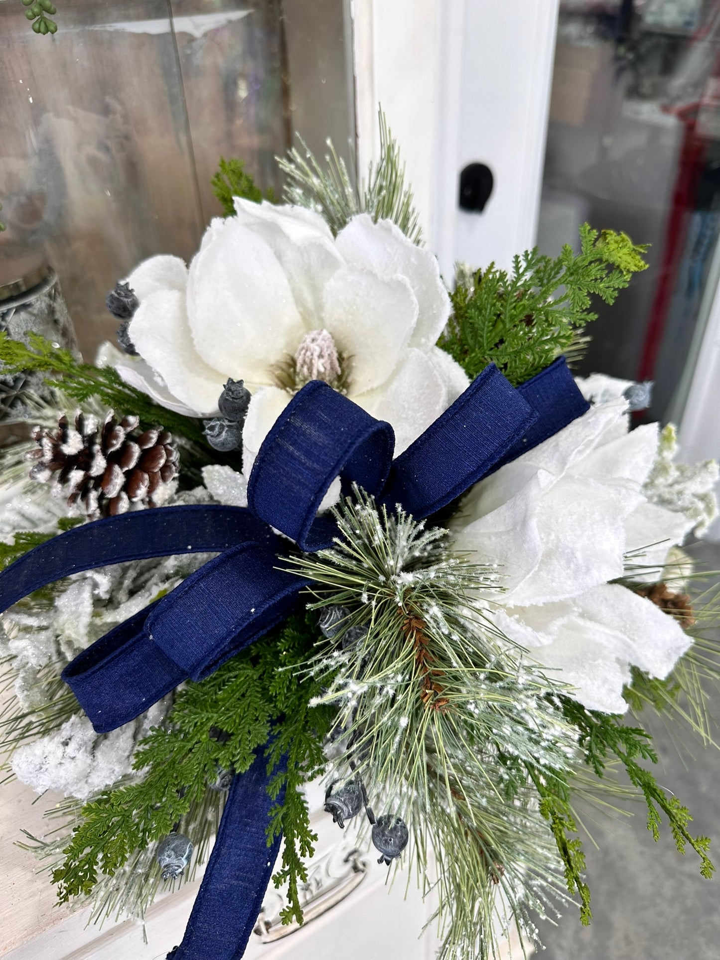 Snowy Magnolia and Blue Crabapple Winter Table Centerpiece - Frosted Pine and Pinecone Home Decoration - Foyer Entryway Floral Arrangement
