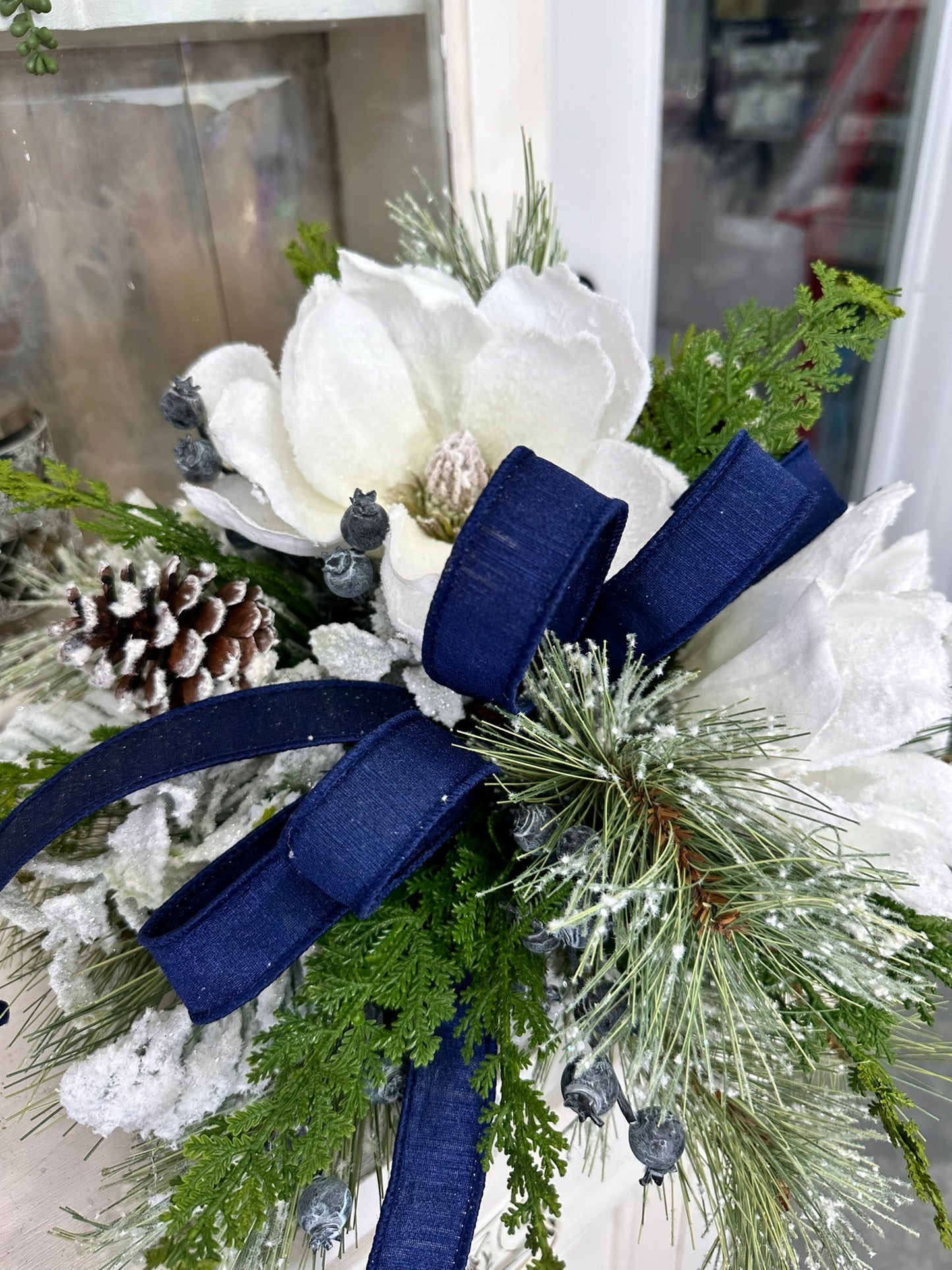 Snowy Magnolia and Blue Crabapple Winter Table Centerpiece - Frosted Pine and Pinecone Home Decoration - Foyer Entryway Floral Arrangement