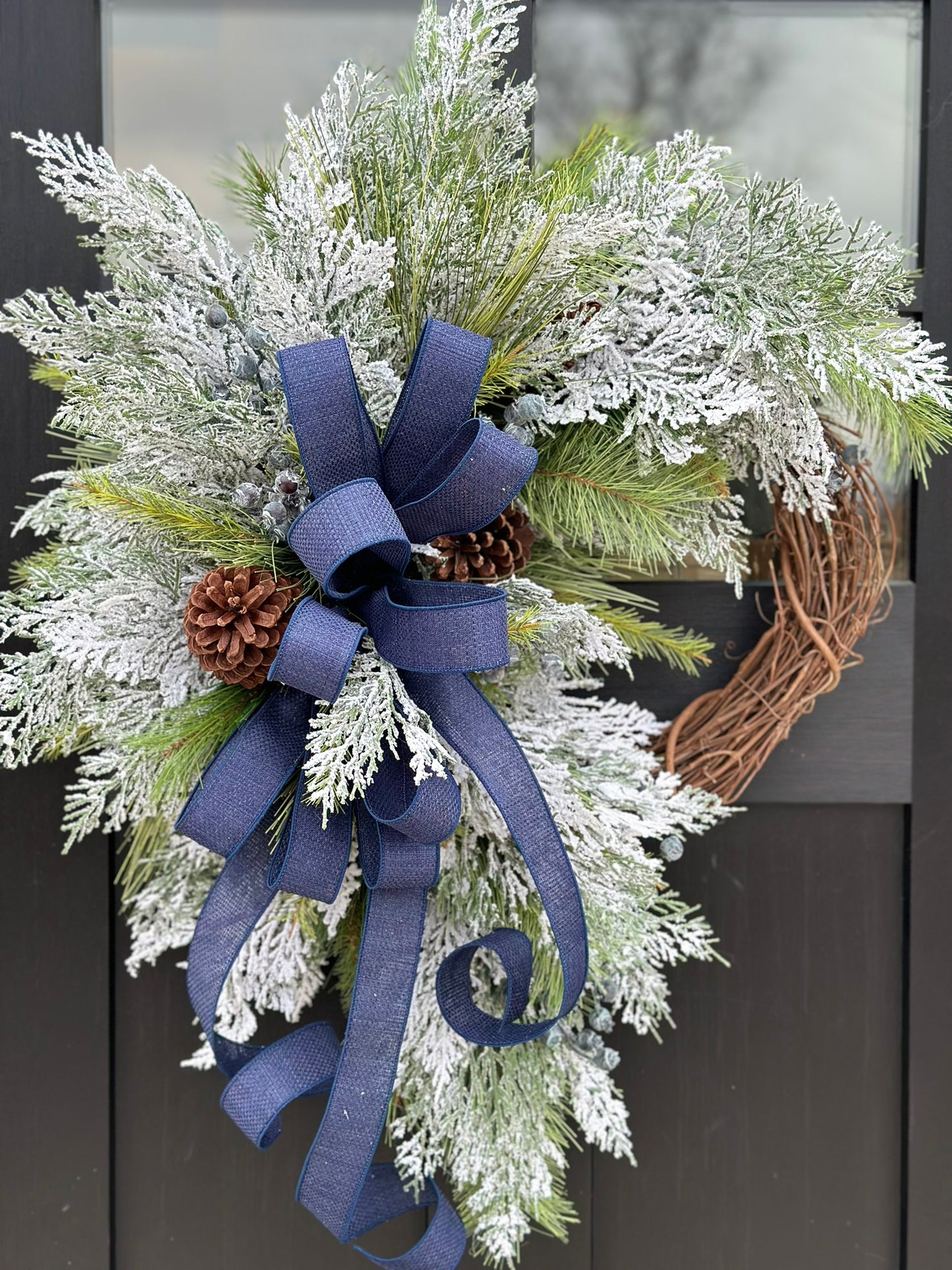 Snowy Navy Winter Crabapple Wreath - Handmade Flocked Cedar & Pine Door Decor for All Winter with Frosted Greenery and Navy Bow