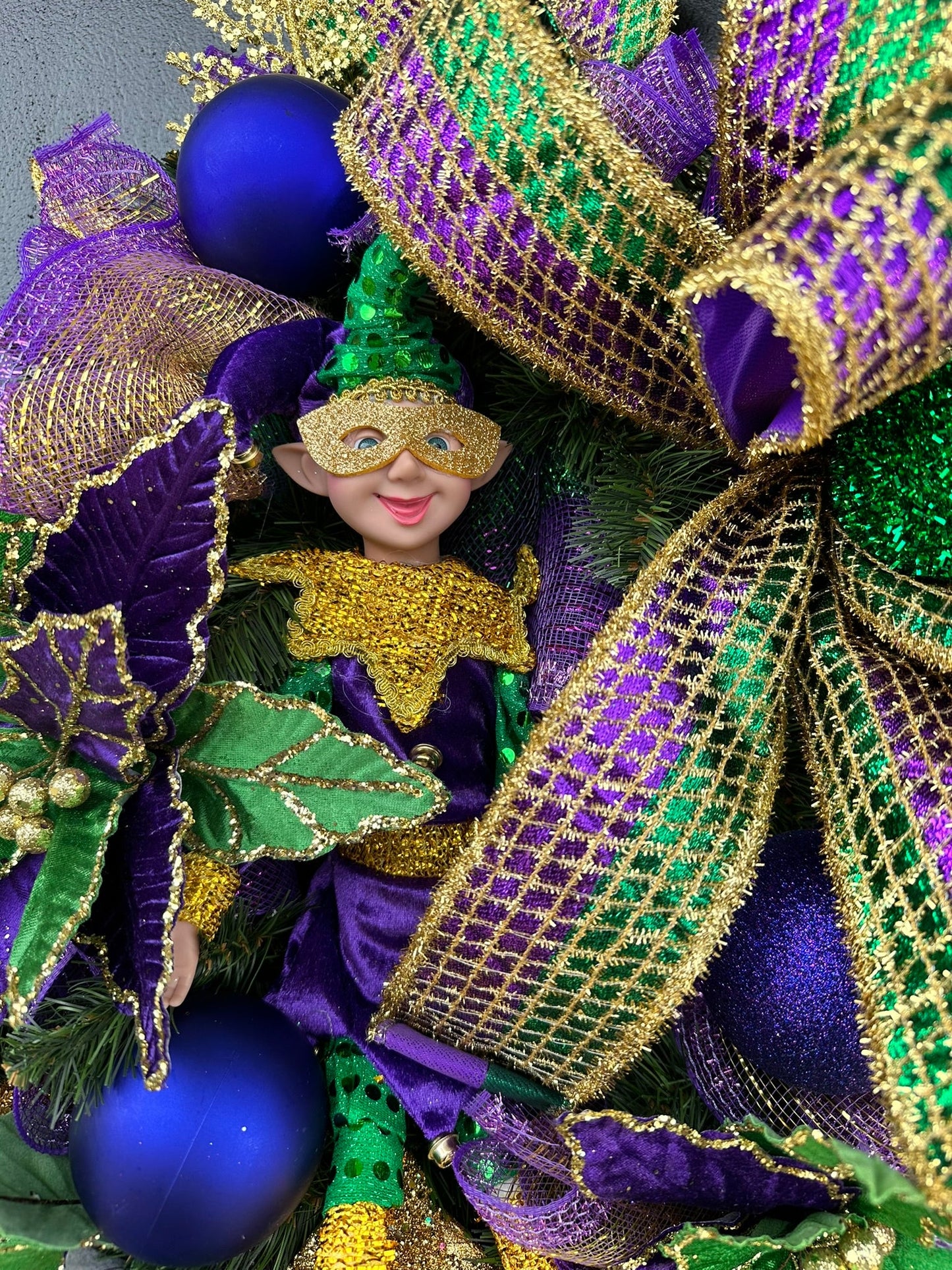 Colorful Mardi Gras Jester Wreath - Festive 32x28 Holiday Door Decor with Poinsettia Flowers, Jester Character Wreath, and Glitter Accents