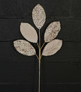 Beaded Glitter Magnolia Leaf Spray | Champagne/Taupe Metallic Velvet Stem | 25" x 5 Leaves Impressive Enterprises, Inc.