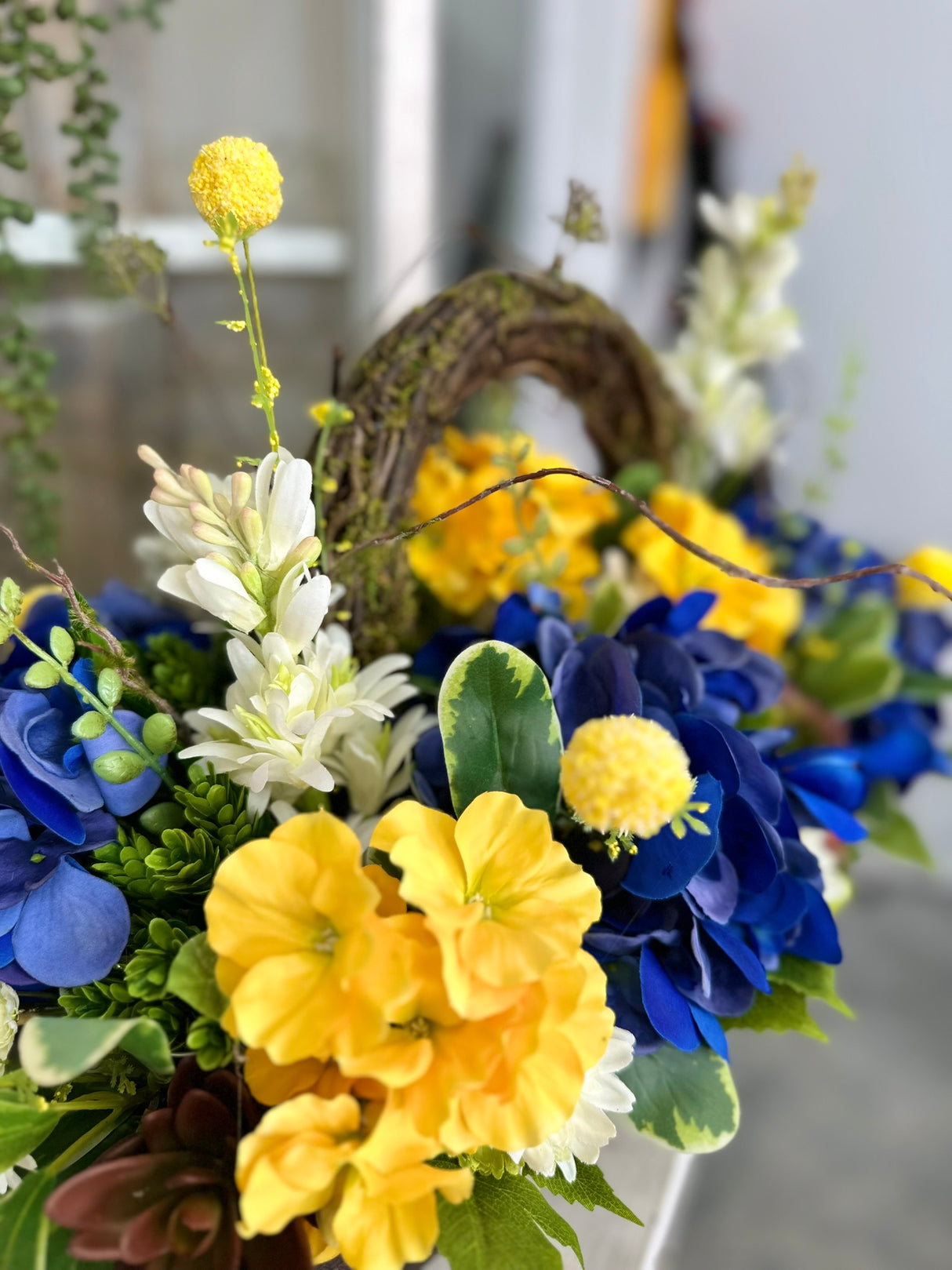 Blue Hydrangea & Yellow Primrose Floral Arrangement in Wooden Dough Bowl – High-End Spring Table Centerpiece