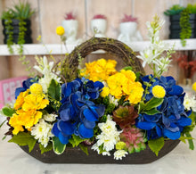 Load image into Gallery viewer, Blue Hydrangea &amp; Yellow Primrose Floral Arrangement in Wooden Dough Bowl – High-End Spring Table Centerpiece