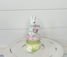 Load image into Gallery viewer, 6&quot; White Resin Bunny on Cupcake with Tea Cup - Pastel Easter Decor - Spring table decoration by TCT Crafts (MT25743)