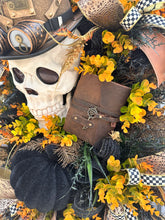 Load image into Gallery viewer, Oversized Steampunk Skull Wreath | XL Halloween and Fall Decor | Animated Skull with Top Hat, Faux Leather Journal, and Wooden Gears