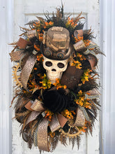 Load image into Gallery viewer, Oversized Steampunk Skull Wreath | XL Halloween and Fall Decor | Animated Skull with Top Hat, Faux Leather Journal, and Wooden Gears