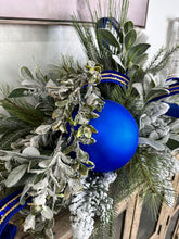 Load image into Gallery viewer, Elegant Blue &amp; White Christmas Centerpiece | Holiday Arrangement with Snowy Lamb’s Ear, Matte Blue Ornaments, and Designer Velvet Ribbon