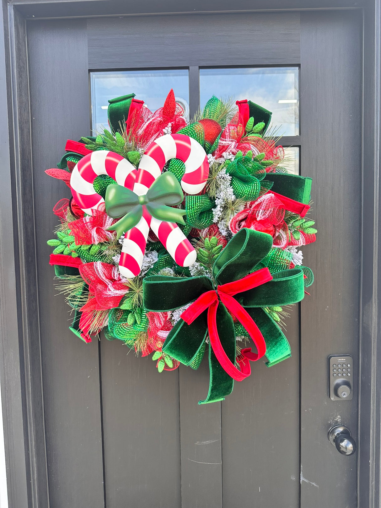 Red & Green Christmas Wreath with Candy Canes, Emerald Velvet Ribbon – 26" Festive Holiday Door Decor