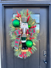 Load image into Gallery viewer, Deluxe Christmas Nutcracker Door Swag - 39&quot; Holiday Front Door Decor with Foam Nutcracker, Flocked Pines, and Festive Ribbon-TCT1703