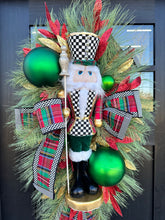 Load image into Gallery viewer, Deluxe Christmas Nutcracker Door Swag - 39&quot; Holiday Front Door Decor with Foam Nutcracker, Flocked Pines, and Festive Ribbon-TCT1703