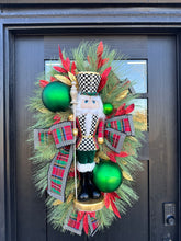 Load image into Gallery viewer, Deluxe Christmas Nutcracker Door Swag - 39&quot; Holiday Front Door Decor with Foam Nutcracker, Flocked Pines, and Festive Ribbon-TCT1703