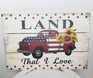 CM2133-12"x8" Wooden Sign with Rope "Land That I Love" Truck with Sunflowers - TCTCrafts